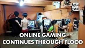Online gaming addicts in cafe continue playing through typhoon flood | New York Post